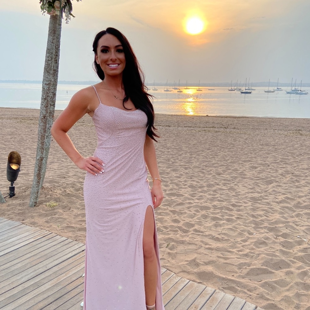 La femme rhinestone beaded Jersey gown.